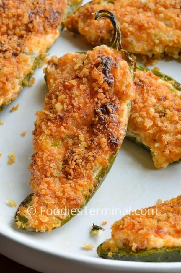 jalapeno poppers in air fryer on a white plate