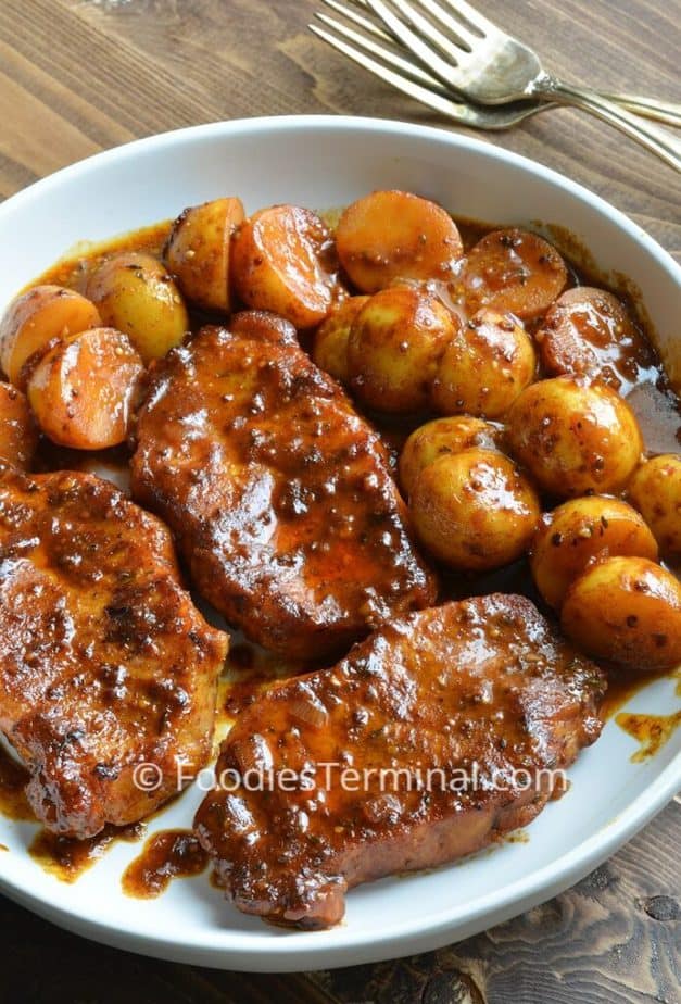 instant pot pork chops and potatoes in a white plate