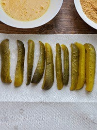 pickle spears on a white kitchen towel