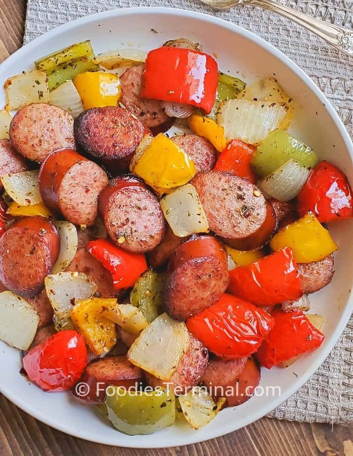 air fryer sausage and peppers in a white plate