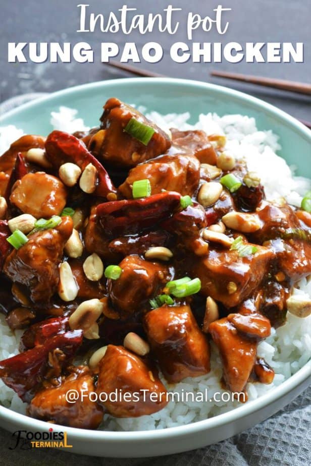 best kung pao chicken recipe on top of white rice garnished with roasted peanuts