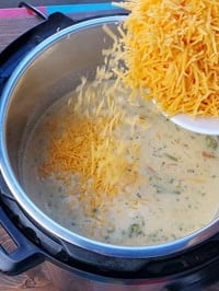adding shredded sharp cheddar cheese in instant pot