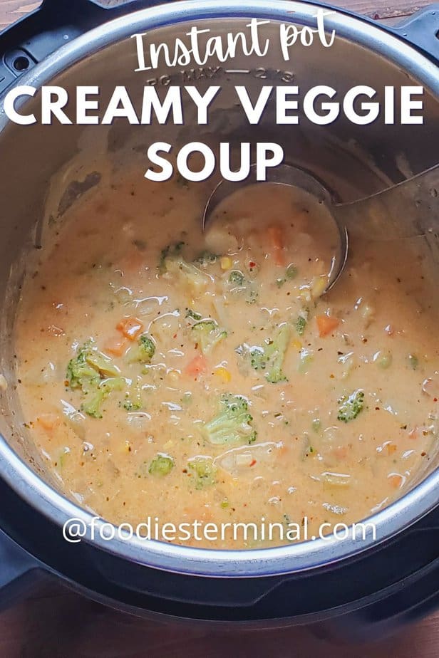 beat creamy vegetable soup in instant pot with a ladle