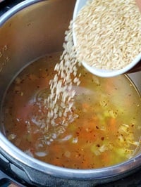 adding unwashed brown rice